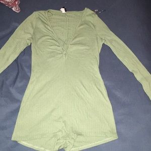 Green strapped body suit